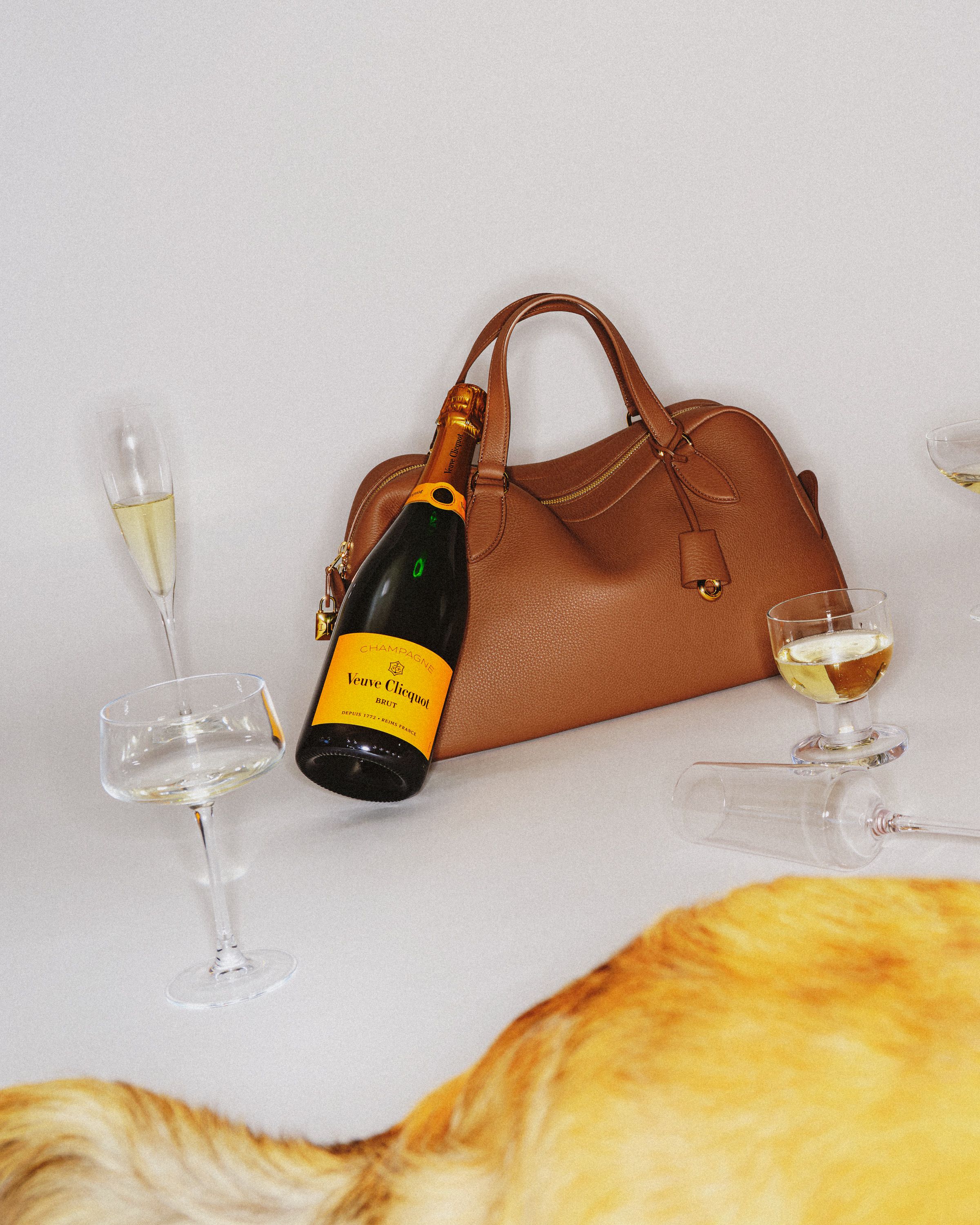 Bags and Bottles for Flaunt by Laura Woolf, 2025 — Flaunt bags and bottles Veuve